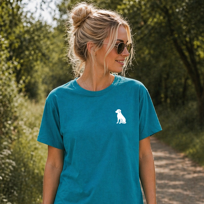 Woman wearing a blue t-shirt with a white dog logo outdoors