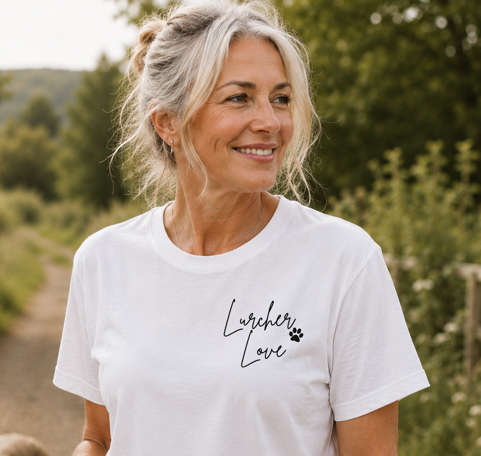 Woman wearing a white t-shirt with 'Lurcher Love' text in a natural setting